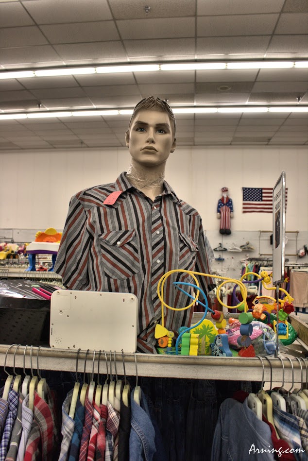 Mannequin with his head taped on at the Family Thrift Center