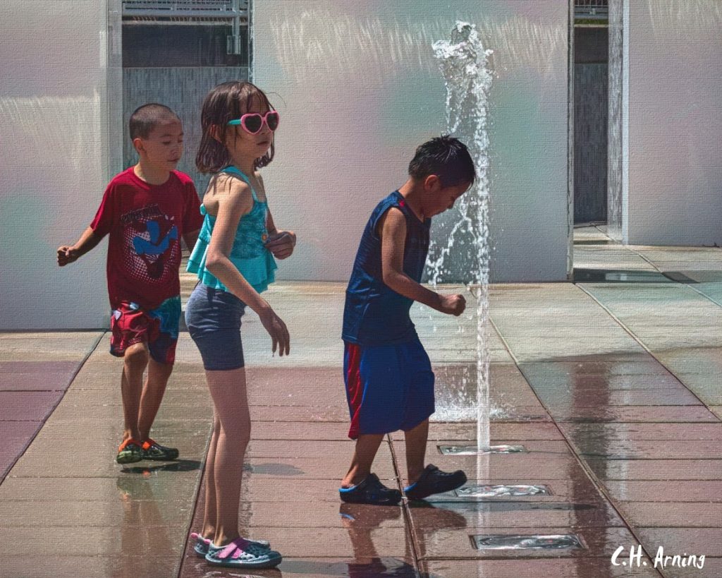 playing in the fountain