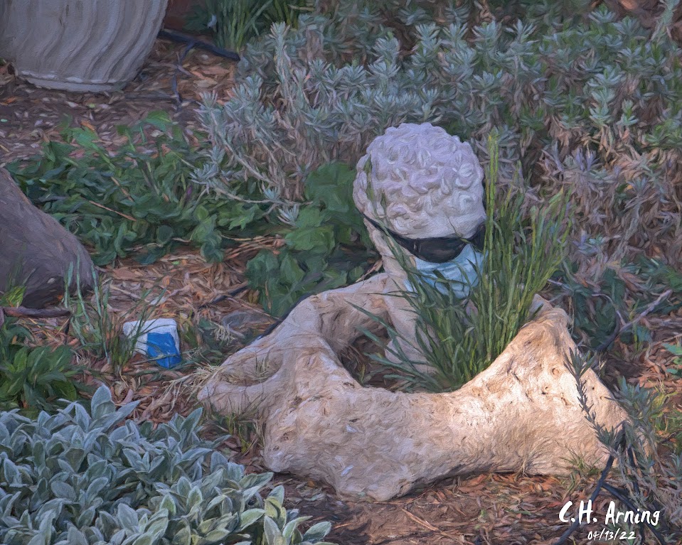 masked yard art